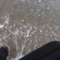 Oh no! The waves caught my feet!